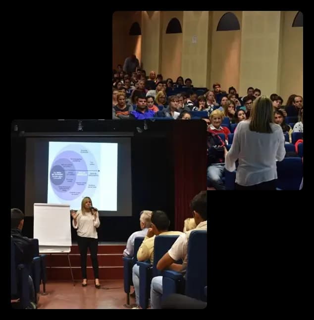 Ine dando una conferencia a un auditorio